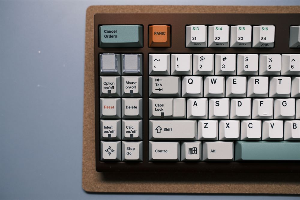 Close-up of the left macro column with clear keycaps and terminal legends