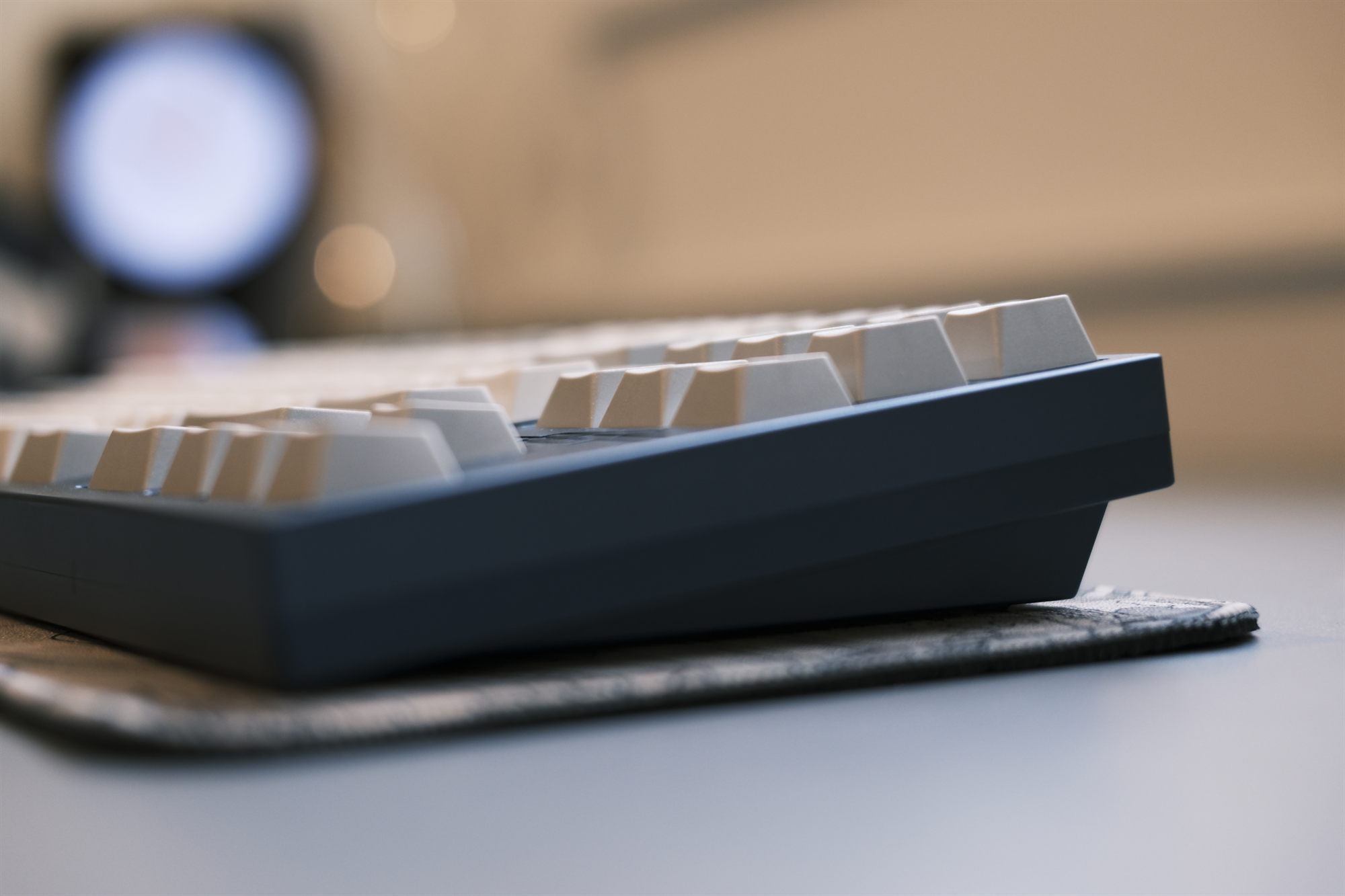 TGR Jane v2 OG, low side profile — slate blue-gray anodized case with cream GMK Mut keycaps